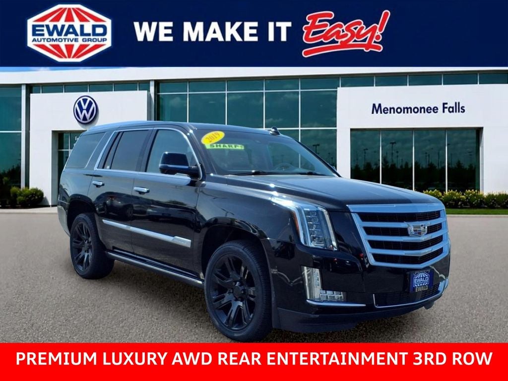 2019 Cadillac Escalade Premium Luxury in Black Raven — front three-quarter view