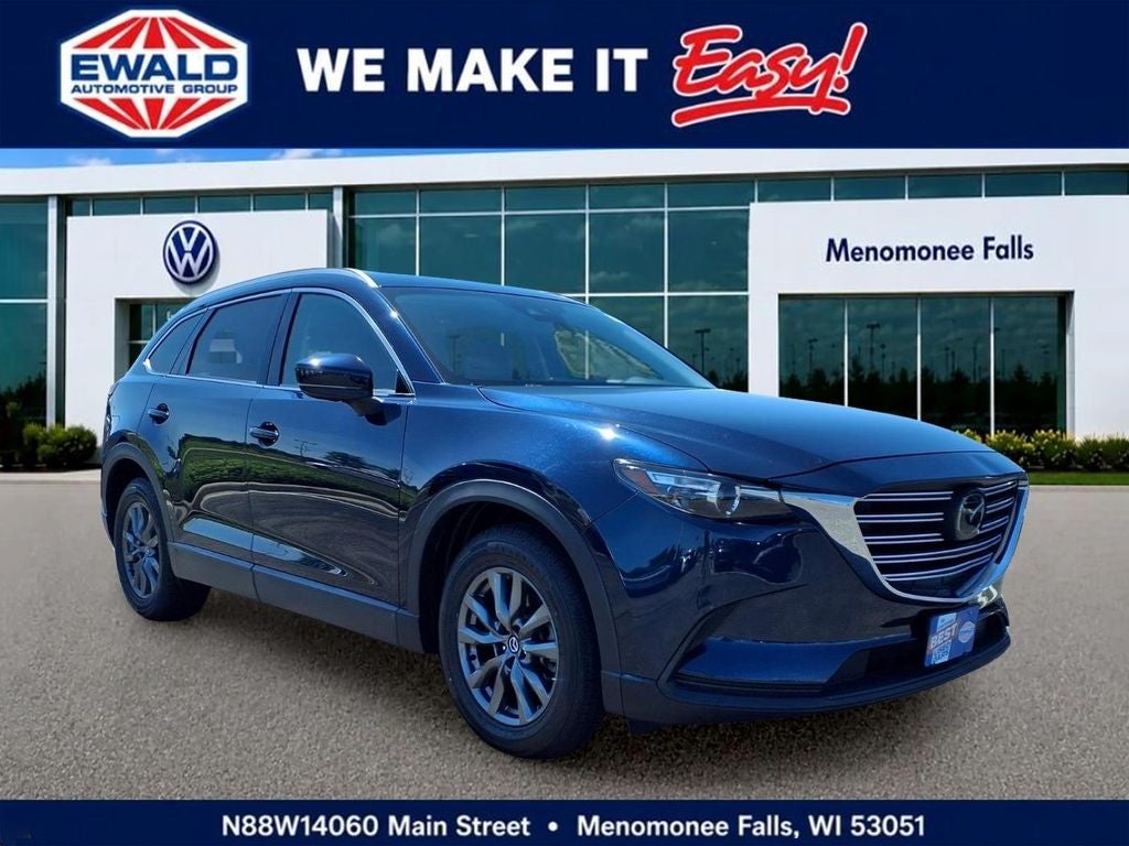 2021 Mazda Mazda CX-9 Touring in Deep Crystal Blue Mica — front three-quarter view